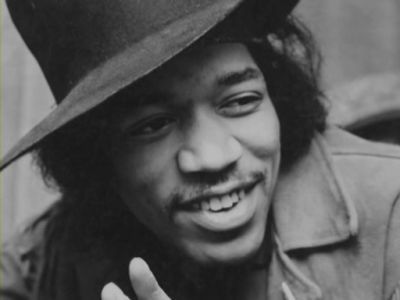 Jimi Hendrix smiling. black and white photo